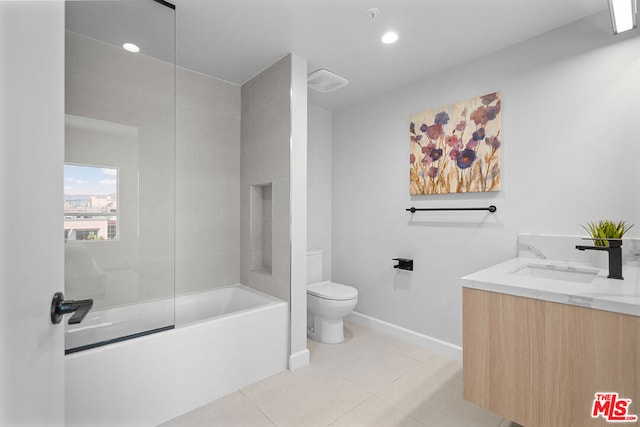 full bathroom with tile patterned floors, shower / tub combination, vanity, and toilet