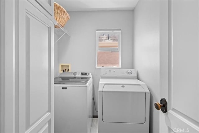 laundry area featuring washing machine and dryer