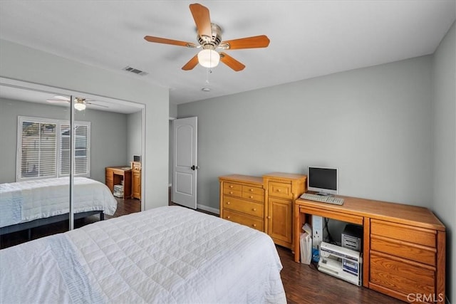 bedroom featuring ceiling fan and dark hardwood / wood-style flooring