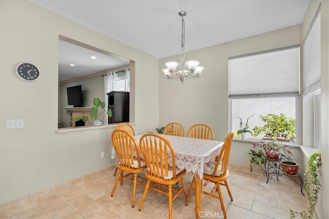 dining area with a notable chandelier