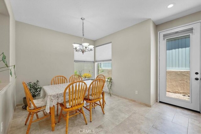 dining area with a chandelier