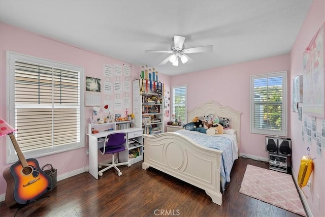 bedroom featuring ceiling fan and dark hardwood / wood-style flooring