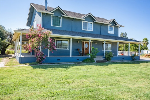 view of front of property featuring a front yard and a porch