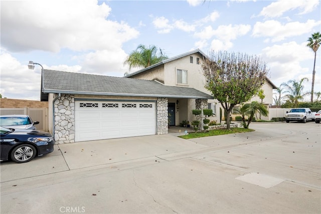 view of front property with a garage