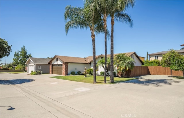 single story home featuring a garage