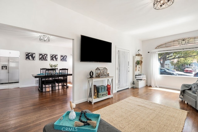 living room featuring dark hardwood / wood-style flooring