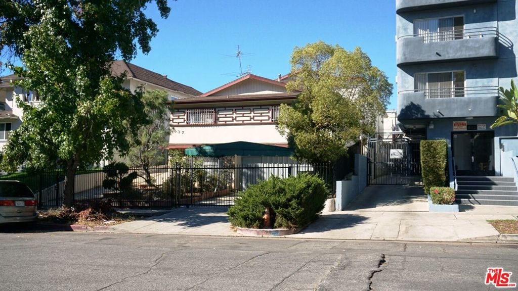 view of front of home with a balcony