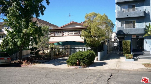 view of front of home with a balcony