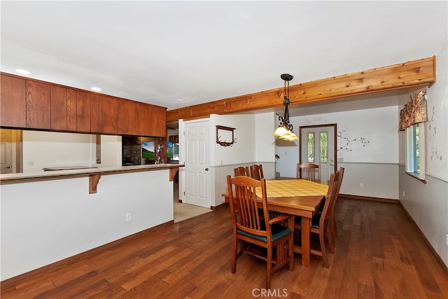 dining room with dark wood-type flooring