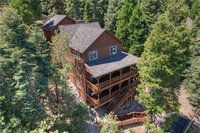 drone / aerial view with a forest view