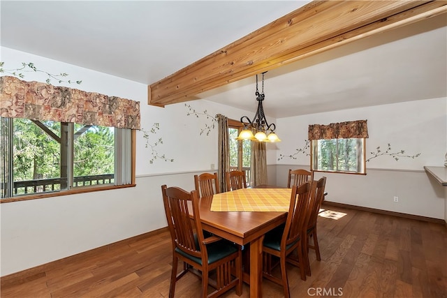 dining room featuring an inviting chandelier, beamed ceiling, and dark hardwood / wood-style flooring