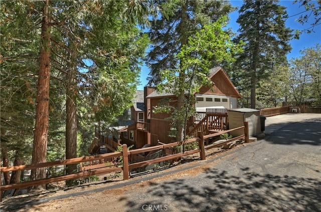 view of front of house featuring an outbuilding and a garage