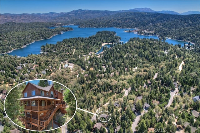 bird's eye view featuring a water and mountain view