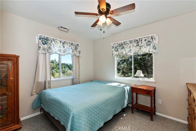 bedroom featuring carpet and ceiling fan