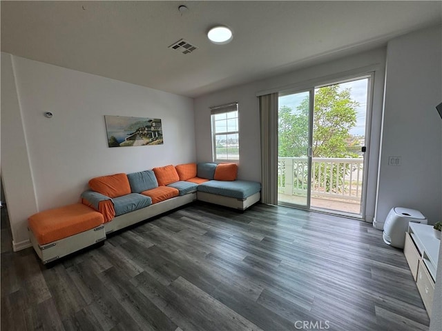 living room with dark wood-type flooring