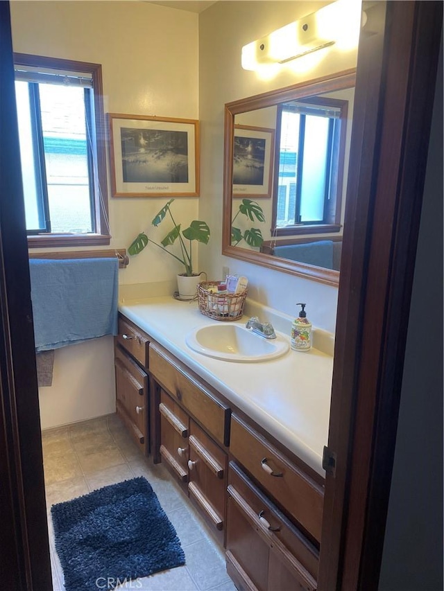 bathroom featuring tile patterned floors and vanity