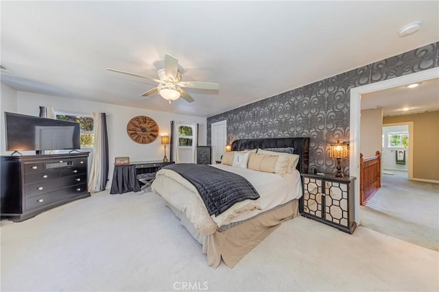 46469 Wallu Ln, Ahwahnee, CA 93601 - bedroom featuring carpet floors, wallpapered walls, an accent wall, and multiple windows