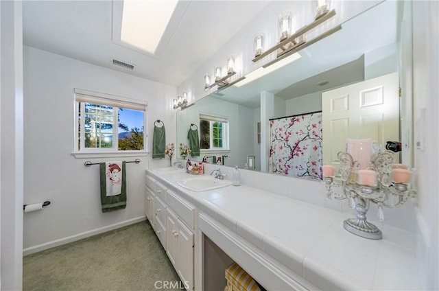 46469 Wallu Ln, Ahwahnee, CA 93601 - full bath featuring baseboards, visible vents, and vanity