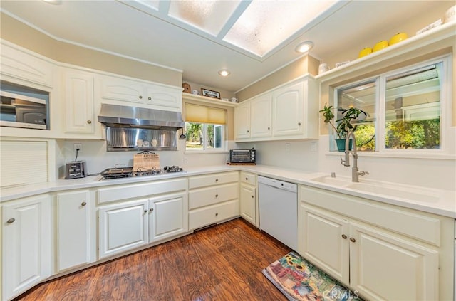 46469 Wallu Ln, Ahwahnee, CA 93601 - kitchen with light countertops, a sink, appliances with stainless steel finishes, under cabinet range hood, and dark wood-style flooring