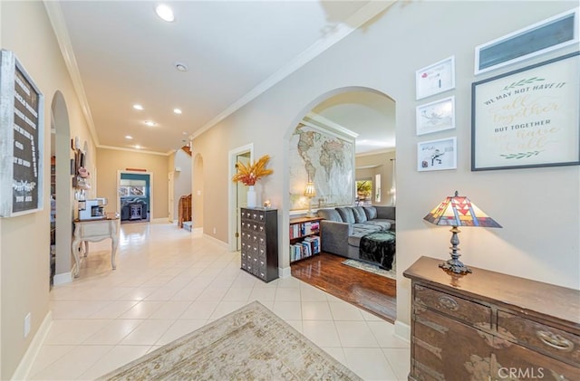 46469 Wallu Ln, Ahwahnee, CA 93601 - hall featuring arched walkways, crown molding, recessed lighting, and light tile patterned flooring