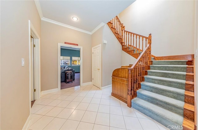 46469 Wallu Ln, Ahwahnee, CA 93601 - foyer with light tile patterned floors, ornamental molding, baseboards, and stairway