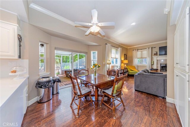 46469 Wallu Ln, Ahwahnee, CA 93601 - dining room with dark wood-type flooring, a ceiling fan, baseboards, and crown molding