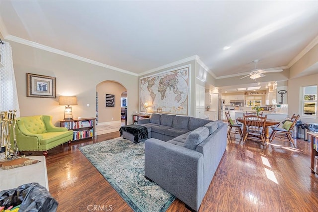 46469 Wallu Ln, Ahwahnee, CA 93601 - living room featuring arched walkways, ceiling fan, wood finished floors, and crown molding