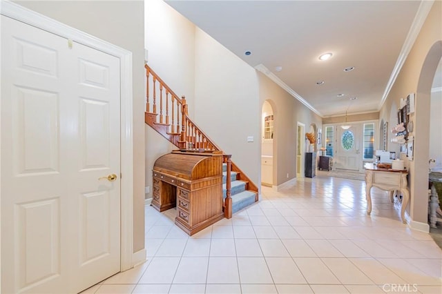 46469 Wallu Ln, Ahwahnee, CA 93601 - foyer featuring light tile patterned flooring, stairs, and arched walkways