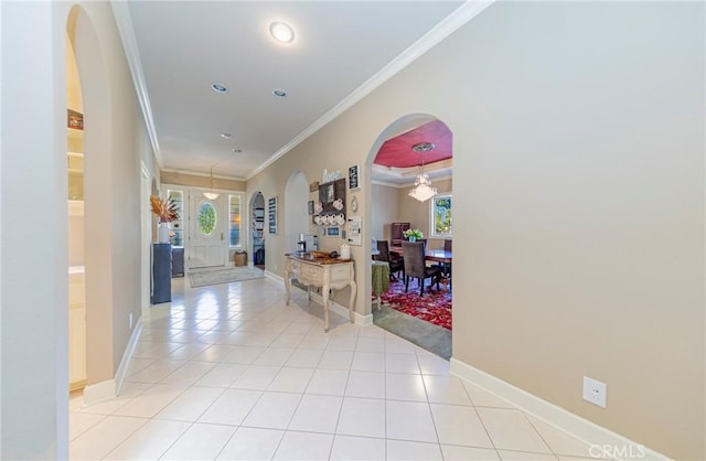 46469 Wallu Ln, Ahwahnee, CA 93601 - hall with light tile patterned flooring, arched walkways, crown molding, and a healthy amount of sunlight