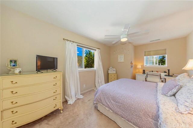 46469 Wallu Ln, Ahwahnee, CA 93601 - bedroom featuring a ceiling fan, light carpet, multiple windows, and visible vents