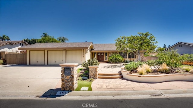 single story home with a garage