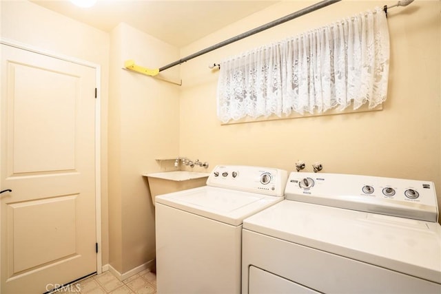 laundry area with washer and dryer