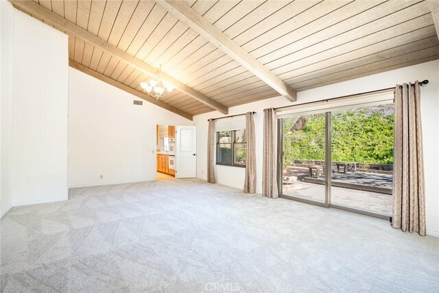 interior space featuring lofted ceiling with beams, wooden ceiling, and an inviting chandelier