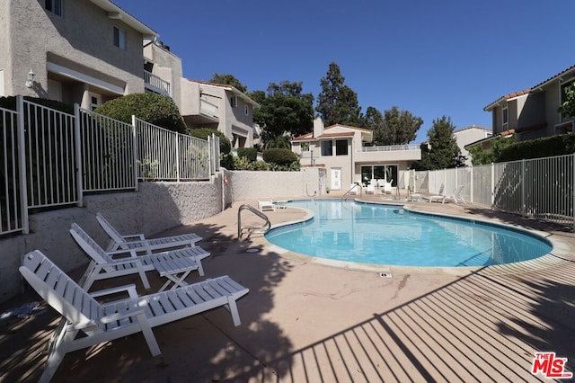 view of pool with a patio