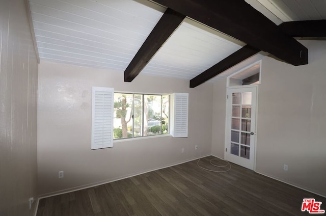 spare room with lofted ceiling with beams and dark hardwood / wood-style flooring