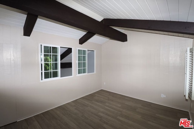 empty room with vaulted ceiling with beams and dark hardwood / wood-style flooring