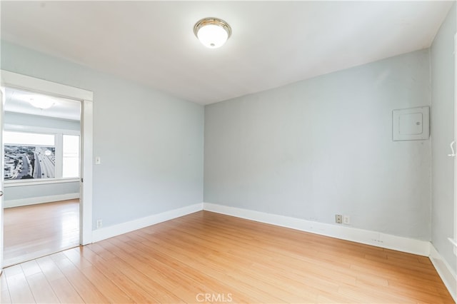 spare room featuring hardwood / wood-style flooring