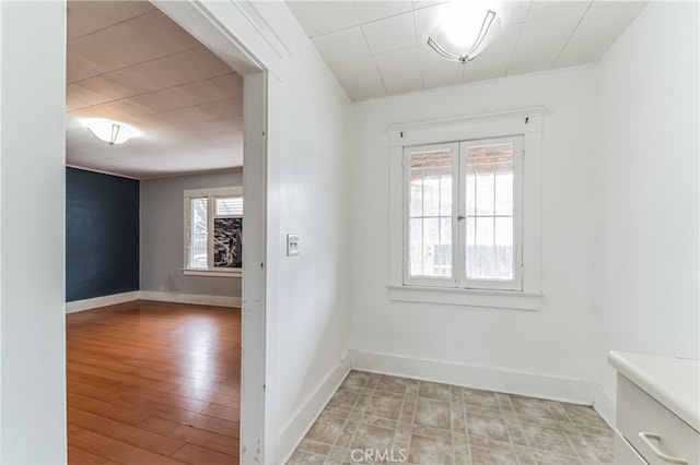 unfurnished room with light hardwood / wood-style flooring