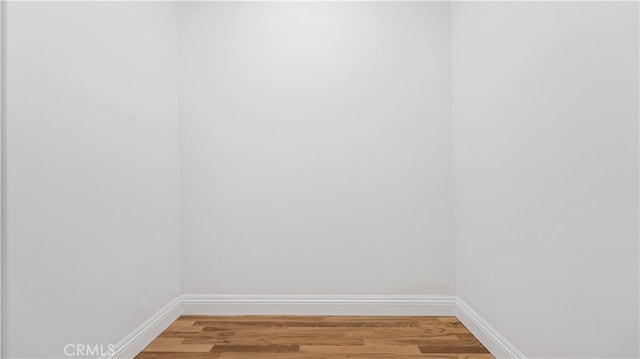 empty room featuring hardwood / wood-style floors