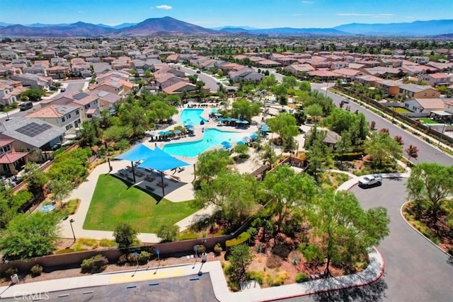 birds eye view of property featuring a mountain view