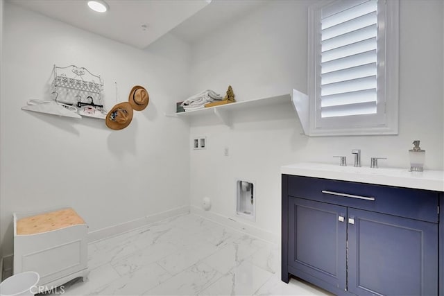 laundry room featuring washer hookup, sink, hookup for an electric dryer, hookup for a gas dryer, and cabinets