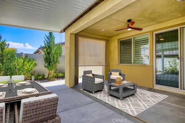 view of patio / terrace featuring ceiling fan