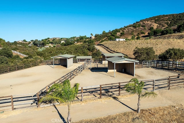 exterior space with a rural view