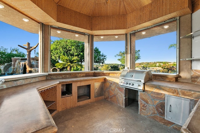 view of patio / terrace featuring exterior kitchen and grilling area