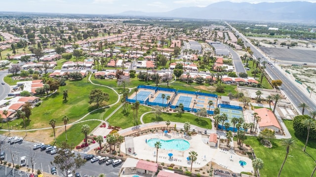 drone / aerial view with a residential view and a mountain view