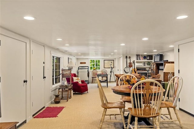 view of carpeted dining space