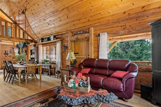 living room with wooden ceiling, light hardwood / wood-style floors, vaulted ceiling, and wood walls