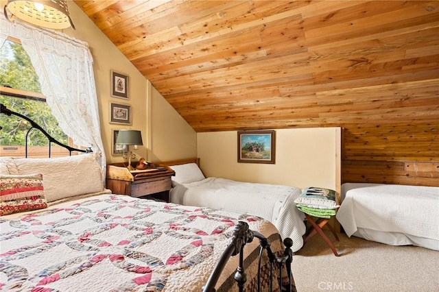 carpeted bedroom with lofted ceiling and wooden ceiling