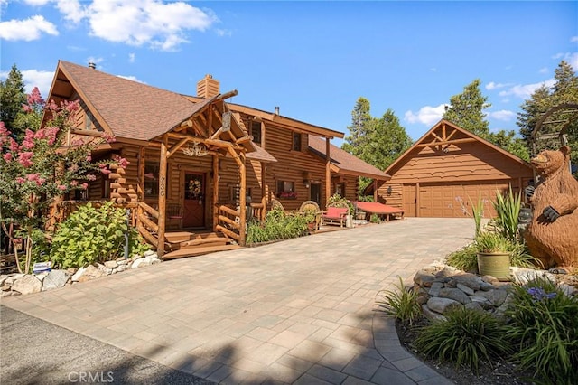 log home with a garage