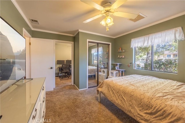 bedroom featuring ceiling fan, crown molding, and light carpet